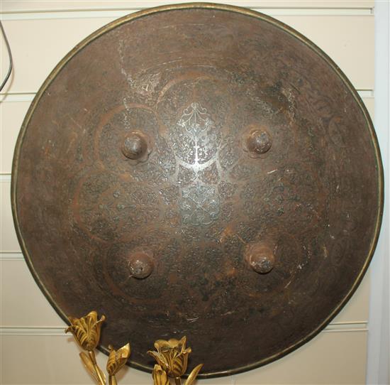 An Indo Persian chiselled steel circular dhal,